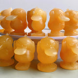 Orange Calcite Psyduck Carvings