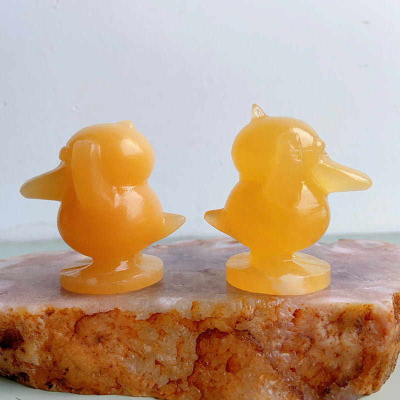 Orange Calcite Psyduck Carvings