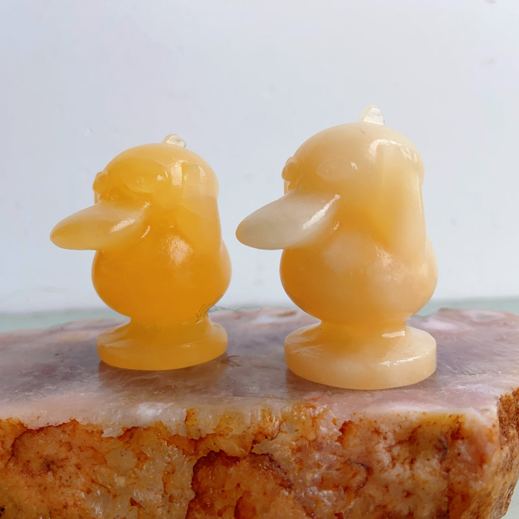 Orange Calcite Psyduck Carvings