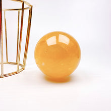 Load image into Gallery viewer, Natural Honey Calcite Sphere